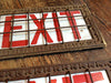 Caged Exit Signs