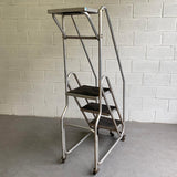 Tall Industrial Machine-Age Rolling Aluminum Ladder