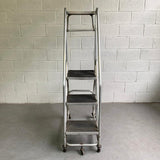 Tall Industrial Machine-Age Rolling Aluminum Ladder
