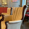 Pair Of Cream Vinyl Mahogany Wingback Armchairs