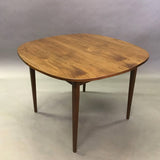 Rounded Walnut Dining Table